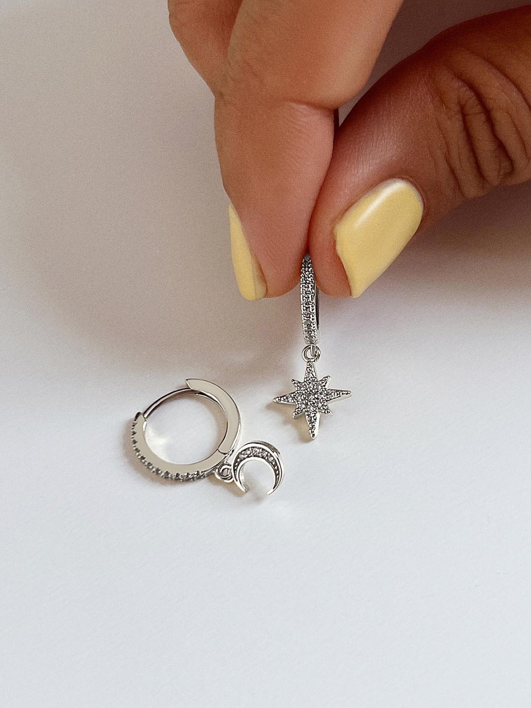 Crescent Moon Huggie Hoops - Celeste Silver